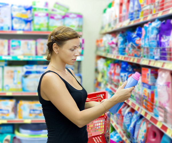 Woman selecting laundry care products