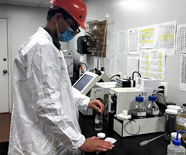 Technician running a test in Tilley's lab.