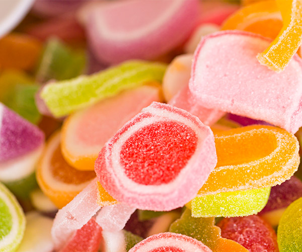 Brightly colored sour gummy candy.