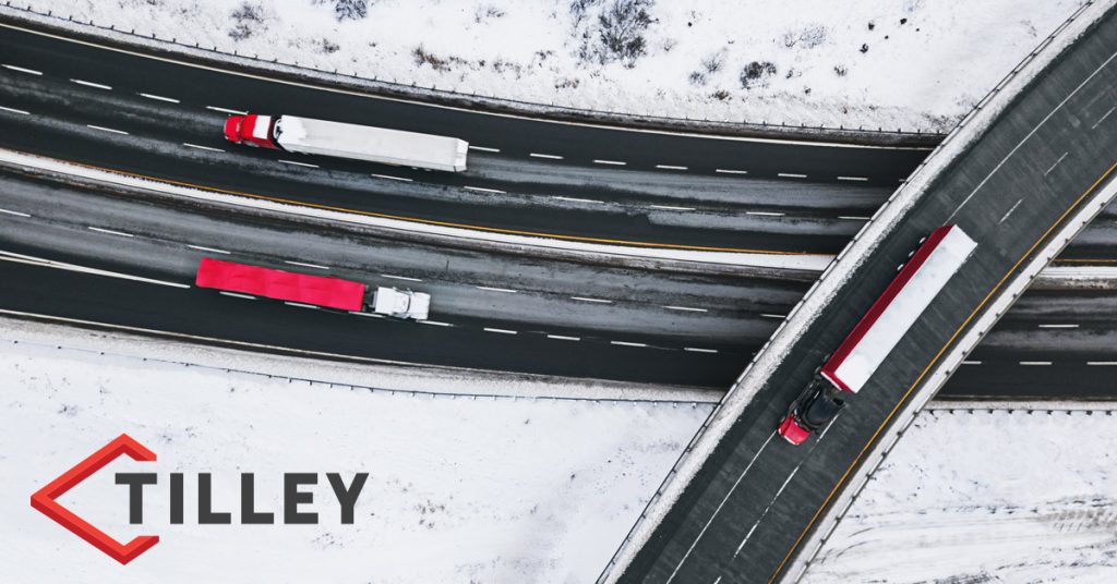 Aerial shot of semi trucks on snowy highways with Tilley Company logo in bottom left-hand corner.
